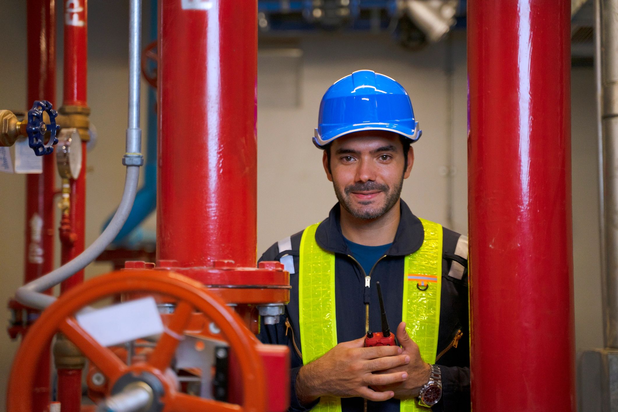 Technician inspecting residential utility area